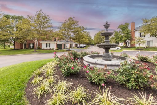 This is a photo of the fluntain in the roundabout on Village Drive in front of the leasing office at Washington Park Apartments in Centerville, OH.