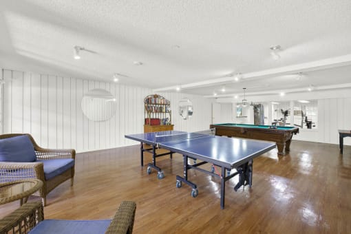 a game room with a ping pong table at Camino de Oro Apartments, California, 90505