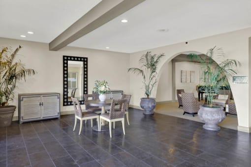 the dining room is open to the living room and kitchen at Copa Ladeene Apartments, California