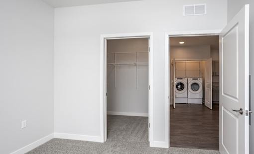 A laundry room with a washer and dryer.