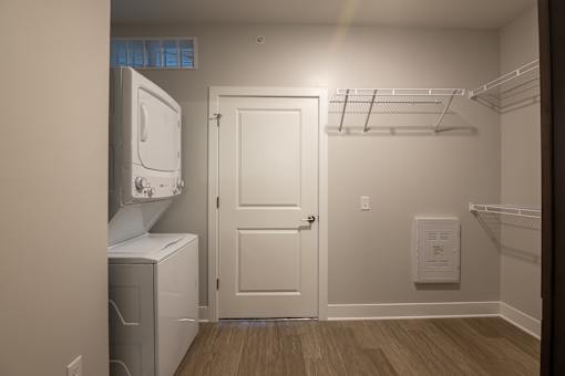 A small laundry room with a washer and dryer.