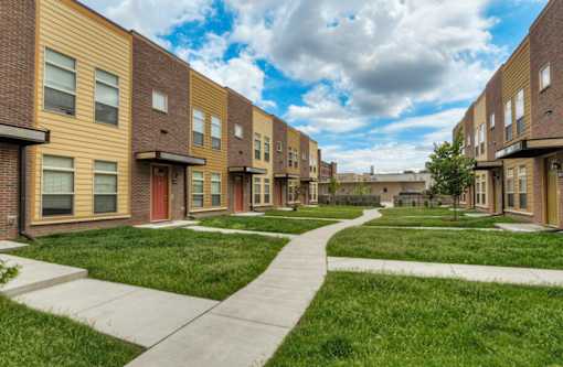 Community Exterior and Green Walkways at 7th Street Brownstones, Indigo Living, IA, 50309