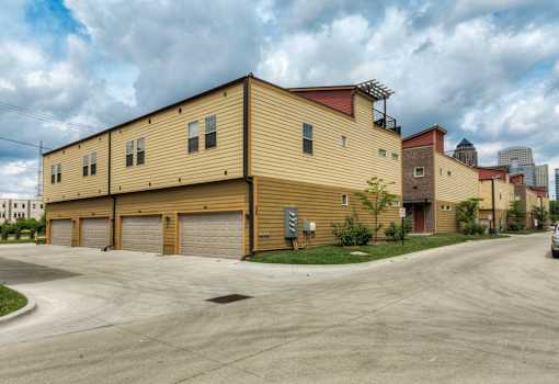 Houses With Attached Garage at 7th Street Brownstones, Indigo Living, IA