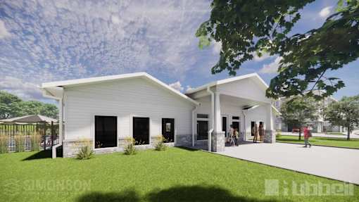 A modern white house with a black door and windows is surrounded by greenery. at Callaway at Holland Pointe Apartments, Norwalk