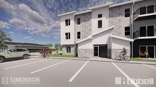 A modern apartment complex with a parking lot in front. at Callaway at Holland Pointe Apartments, Apartments, Norwalk, IA