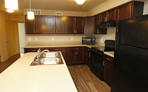 Fully Equipped Kitchen With Ample Storage at Cedarbrooke Place , Norwalk, IA, Iowa