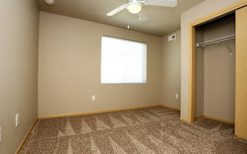 Walk-In Closets With Built-In Shelving at Cedarbrooke Place , Norwalk, IA