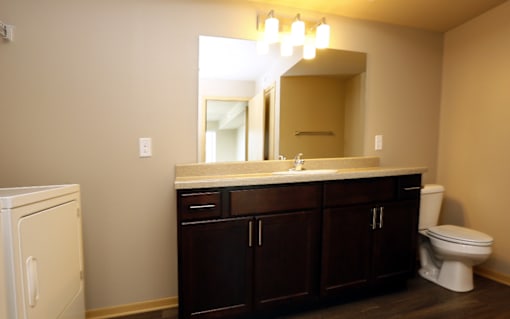 Modern Bathroom with Framed Mirror at Cedarbrooke Place , Iowa