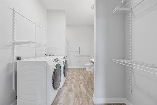 A laundry room with a washer and dryer.