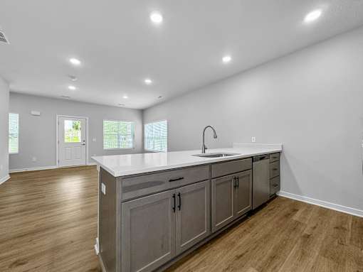 a kitchen with a large counter top and a sink at Soll, Iowa   