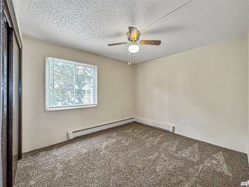 Carpeted Bedroom at Foxwood Apartments, Indianola, IA, 50125