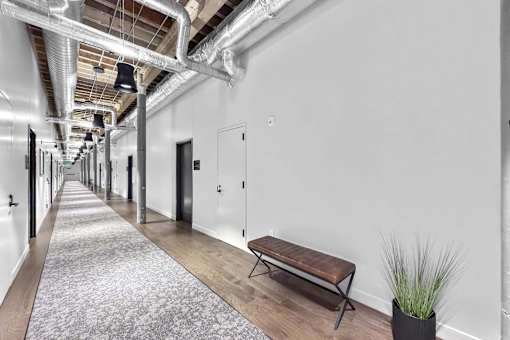 A long hallway at Plant 1 Lofts, N. Newton  