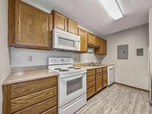 a view of the ceiling of a room with wood cabinets at Creekstone Falls, South Dakota