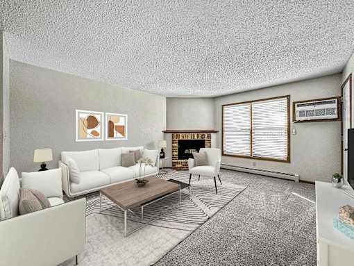 a living room with white furniture and a fireplace at Creekstone Falls, Sioux Falls, SD