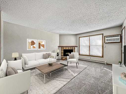 a living room with white furniture and a fireplace at Creekstone Falls, Sioux Falls, SD, 57106
