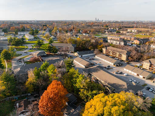 A view of a residential area with houses and trees at Rosemont Place Apartments, Iowa