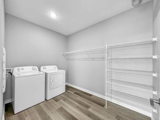 spacious laundry room with washer and dryer at Converge NW, Iowa  