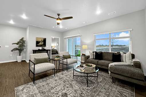 a living room with couches and chairs at Converge NW, Waukee, IA  