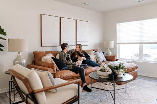 Couple Sitting On Sofa at Forge65, Pleasant Hill, 50327