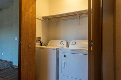 a laundry room with a washer and dryer in it at Sunrise Meadows, Waukee, IA, 50263