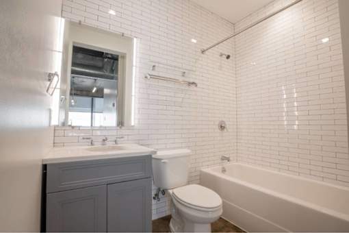 Bathroom With Extra Storage Space and a bathtub at Clemens Building, Iowa
