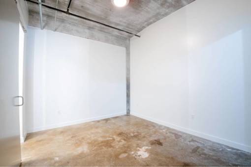 Room with a concrete ceiling at Clemens Building, Des Moines, IA, 50309