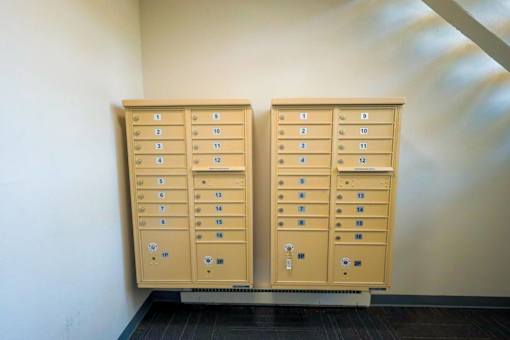 Two large filing cabinets with numbered drawers are standing next to each other at The Hampton Meadows Apartments, IA,50315