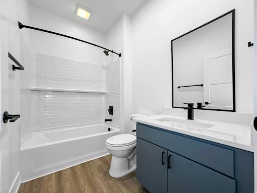 a bathroom with a sink toilet and a shower  at Matilda 235 Townhomes, Des Moines, 50309