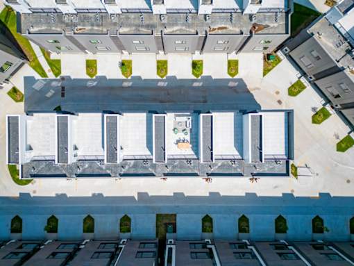 an aerial view of a parking lot on top of a building at Matilda 235 Townhomes, Des Moines, 50309
