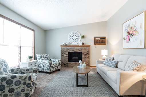 Living Area With Fireplace at Creekstone Falls, South Dakota