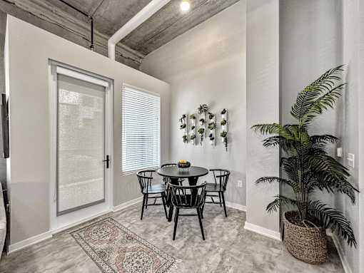 A dining room with a table and chairs.at Level, Iowa   