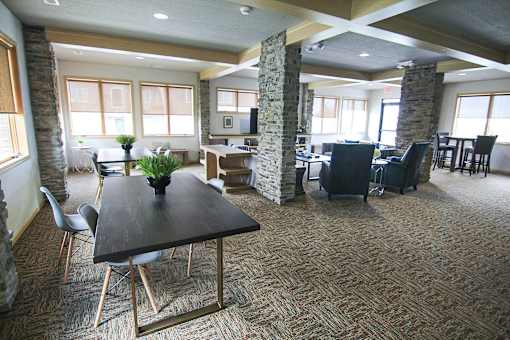 Clubhouse With Expansive Windows at Cedarbrooke Place , Iowa