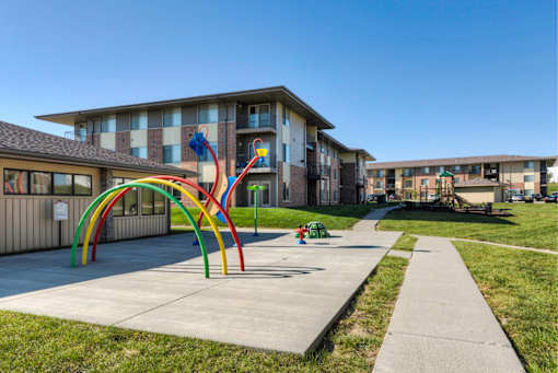 Playground For Children at Cedarbrooke Place , Norwalk, IA, 50211
