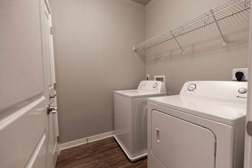 A laundry room with a washer and dryer.