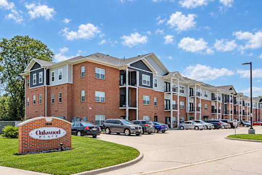 A large brick building with the name Oakwood on it.