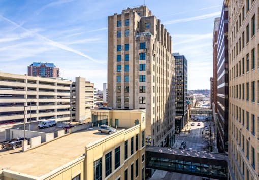 A city street with buildings and cars.