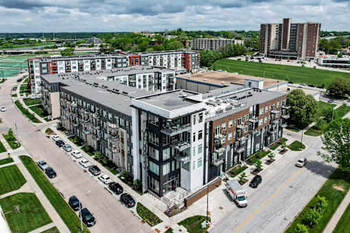 an aerial view of an apartment complex in a city at Velocity Apartments, Des Moines