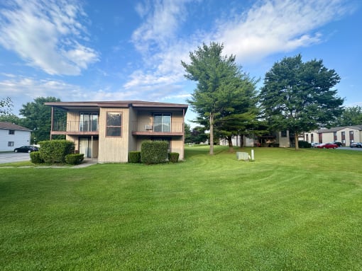 a house with a lawn in front of it