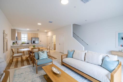 A living room with a couch and a table