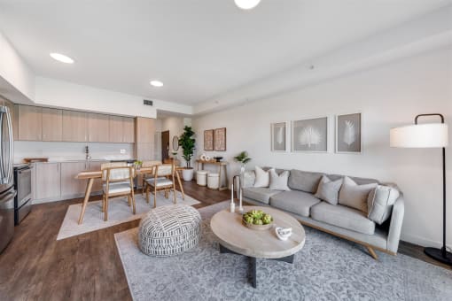 A living room with a couch and a table