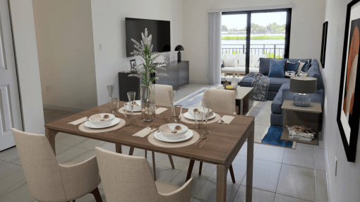 a living room and dining room with a table and chairs