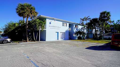 A building with a sign that says Harbor Blue.