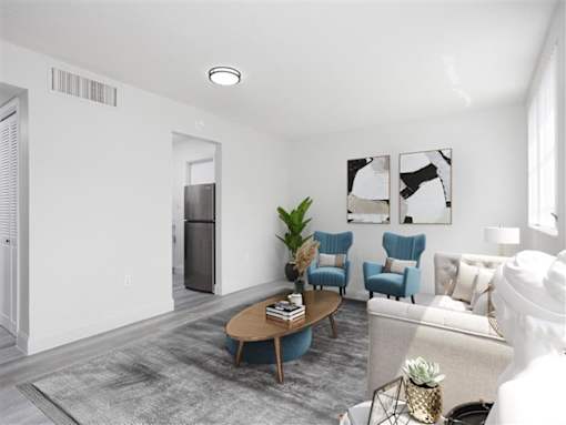 a living room with a couch and a table