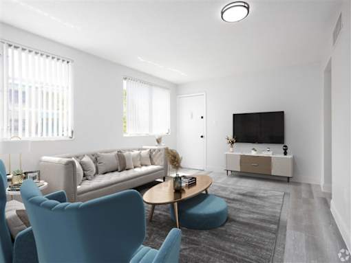 a living room with a couch and a table