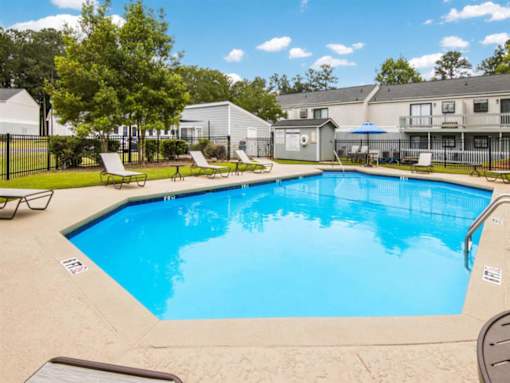 the swimming pool at the apartments for rent