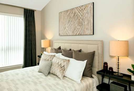 a bedroom with a bed at Encore at Manchester, Novi, Michigan
