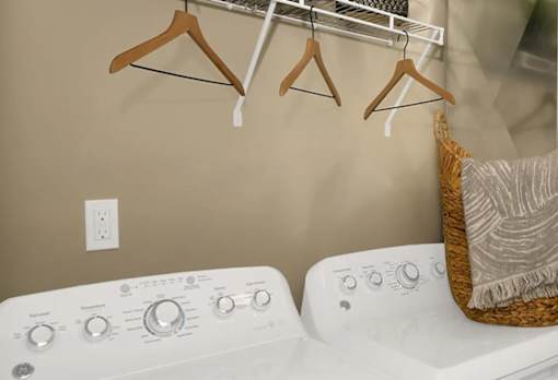 the washer and dryer in the laundry room of a home at Encore at Manchester, Michigan