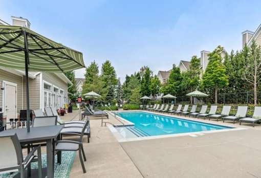 Swimming Pool With Relaxing Sundecks at Encore Townhomes, Utica, MI, Michigan