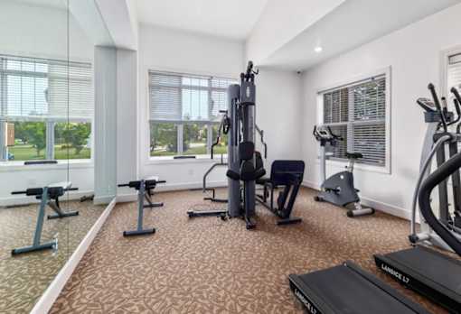 Gym with a exercise bike at Encore Townhomes, Utica
