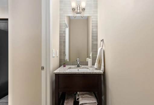 Bathroom with a sink and a mirror at Encore Townhomes, Utica, MI, Michigan , 48315